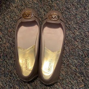Michael Kors “cinder” colored flats.